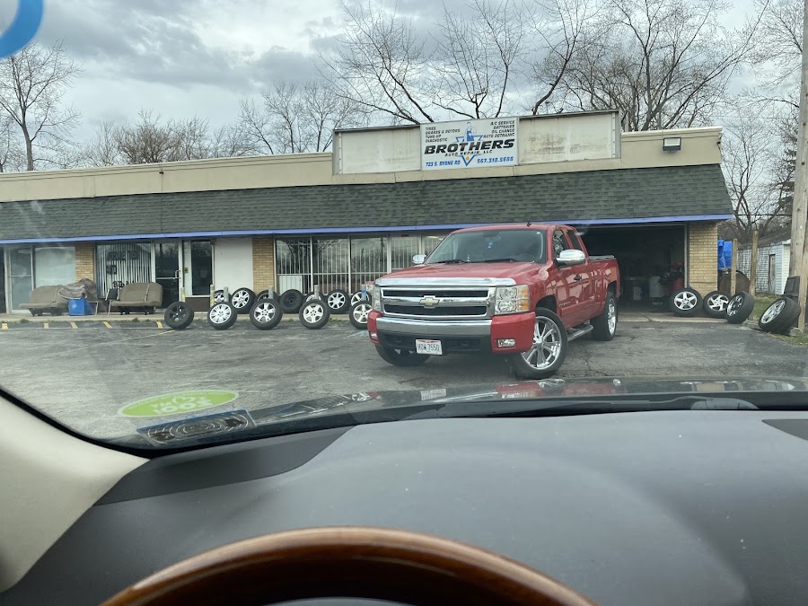 Brothers Auto Repair Mechanics and used tires — real photo from Google
